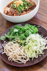Mix vegetable and rice noodles with spicy pork sauce (nam ngiao)