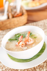 Traditional Thai porridge rice gruel and shrimp in bowl.