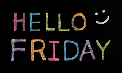 Fototapeta na wymiar Hello Friday written on blackboard