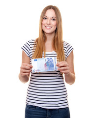 Attractive young woman holding twenty euro