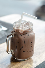 Glass Of Cold Coffee On Wood