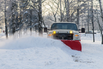 car pickup cleaned from snow by a snowplough during wintertime © smspsy