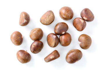Fototapeta premium chestnuts on white, top view