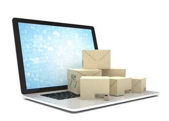 Technology business concept, shipping: cardboard package boxes on laptop