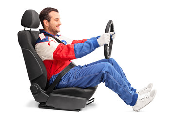 Car racer holding a steering wheel and driving © Ljupco Smokovski