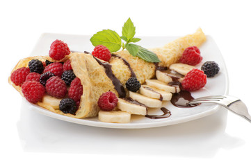Crepe with Strawberry, Raspberry, Blueberry and Chocolate topping. Pancake