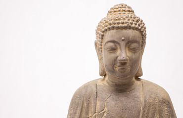 Buddha statue close up on a white background 
