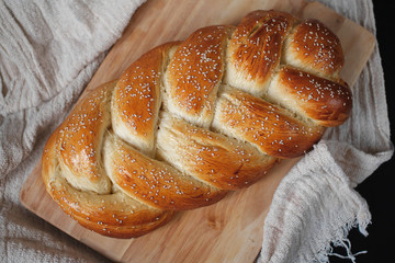 Braided homemade bread with sesame seeds