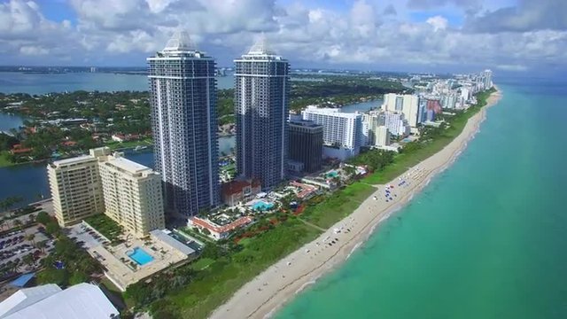 Aerial video of beachfront architecutre in Miami