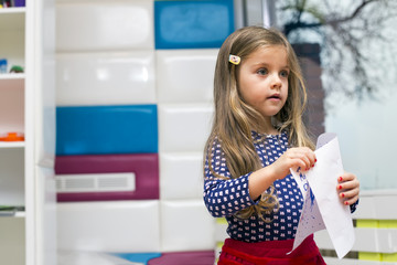 Little girl in the playroom