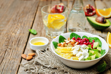 Spinach feta avocado pomegranate orange almond salad with orange