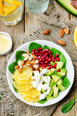 Spinach feta avocado pomegranate orange almond salad with orange