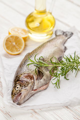 Fresh trout on white wood