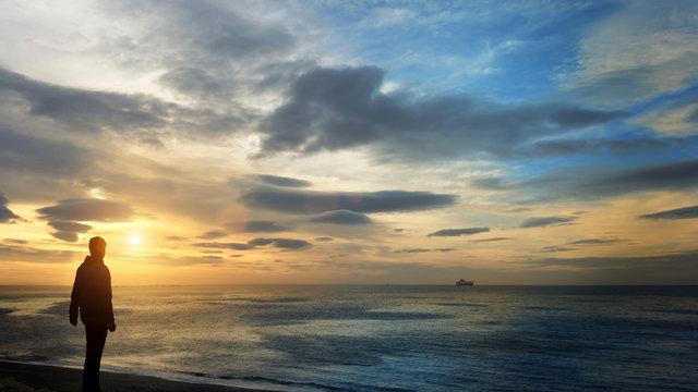 Man and the sky at sunrise