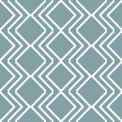 Seamless knitted pattern in white and muted blue colors