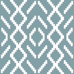 Seamless knitted pattern in white and muted blue colors