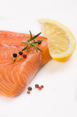 Salmon fillet with peppercorns and Rosemary spice on white backg