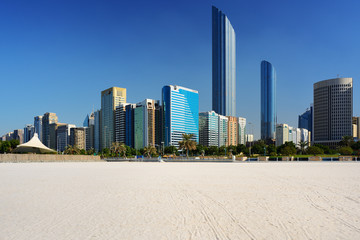 Fototapeta na wymiar Skyscrapers of Abu-Dhabi from the beach