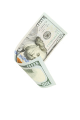 Hundred dollar bill falling on white background