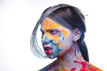 Woman with painted face, body art