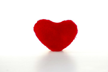 Soft red heart of plush