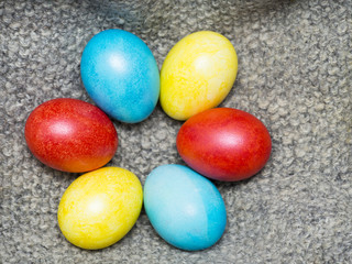 colored eggs on a burlap