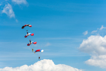 Paratroopers in the sky.
