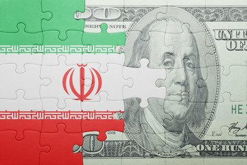 puzzle with the national flag of iran and dollar banknote
