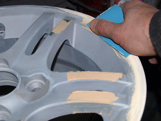 sanding of putty on car wheels