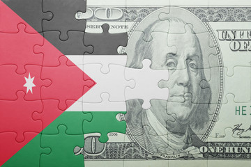 puzzle with the national flag of jordan and dollar banknote