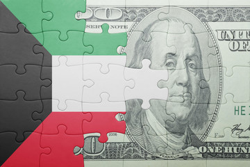 puzzle with the national flag of kuwait and dollar banknote