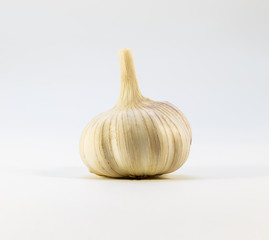 The head of garlic on a white background