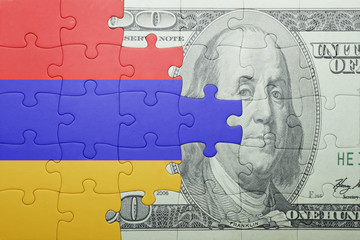 puzzle with the national flag of armenia and dollar banknote