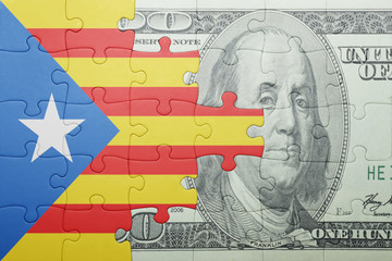 puzzle with the national flag of catalonia and dollar banknote