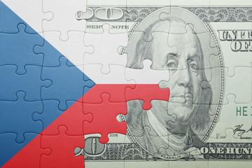 puzzle with the national flag of czech republic and dollar banknote