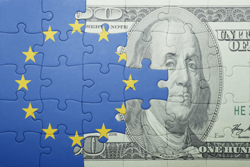 puzzle with the national flag of european union and dollar banknote