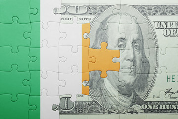 puzzle with the national flag of ireland and dollar banknote