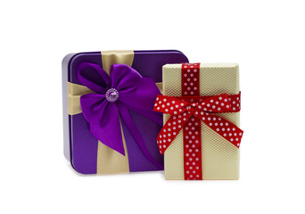 Two colorful gift boxes with ribbon and bow. Isolated on white