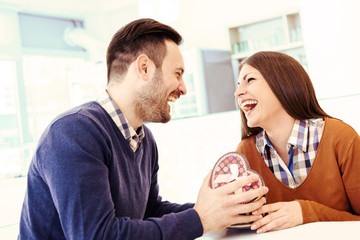 Happy couple in cafe