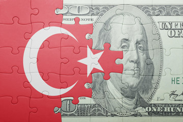 puzzle with the national flag of turkey and dollar banknote