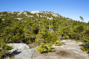 Firetower on open granite dome, summit, Mt. Cardigan, New Hampshire.