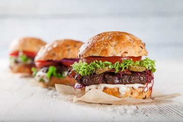 Close-up of home made burgers - obrazy, fototapety, plakaty