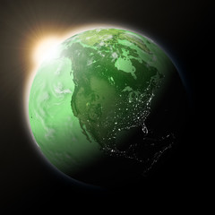 Sun over North America on green planet Earth