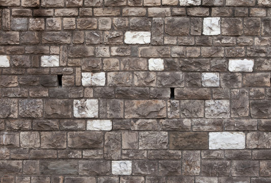 Rough bossage stone masonry. Background texture