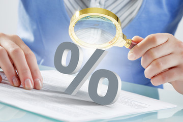 Person using magnifier for exploration