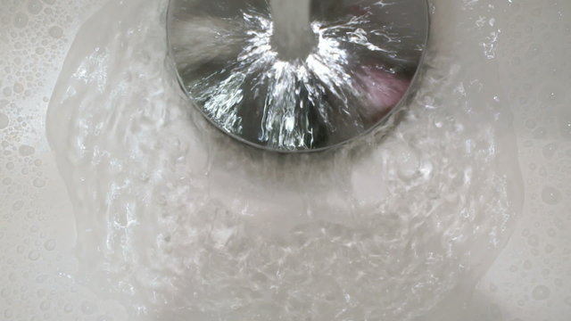 a strong stream of water from the faucet