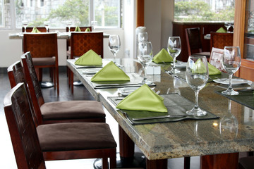 Fototapeta na wymiar professional restaurant serving: table setting in luxury european restaurant, interior