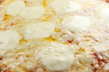 Pizza full of cheese background