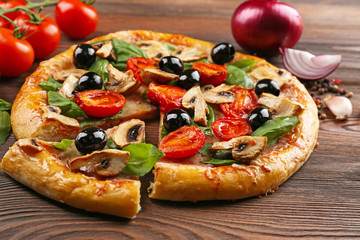 Sliced delicious tasty pizza, closeup
