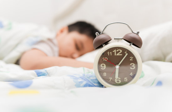alarm clock and sleep child